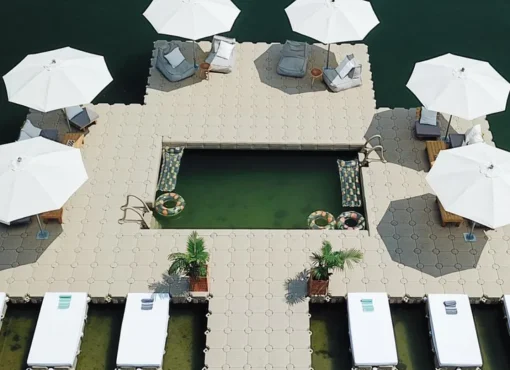 original_image_3d4a27d2-a50b-4dea-b5a9-75c829dd1064 Candock Luxury floating dock lounge setup with umbrellas and seating